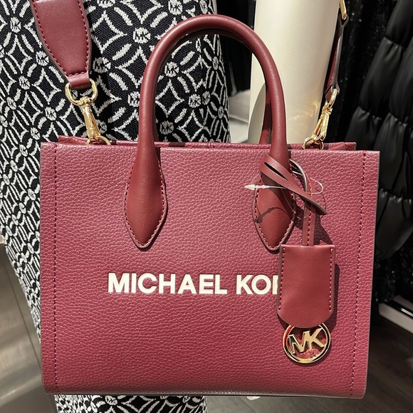 Michael Kors Mirella Small Pebbled Leather Crossbody Bag
Oxblood 
NWT - Picture 6 of 16